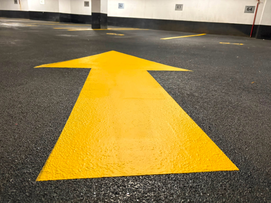 arrow on parking garage..